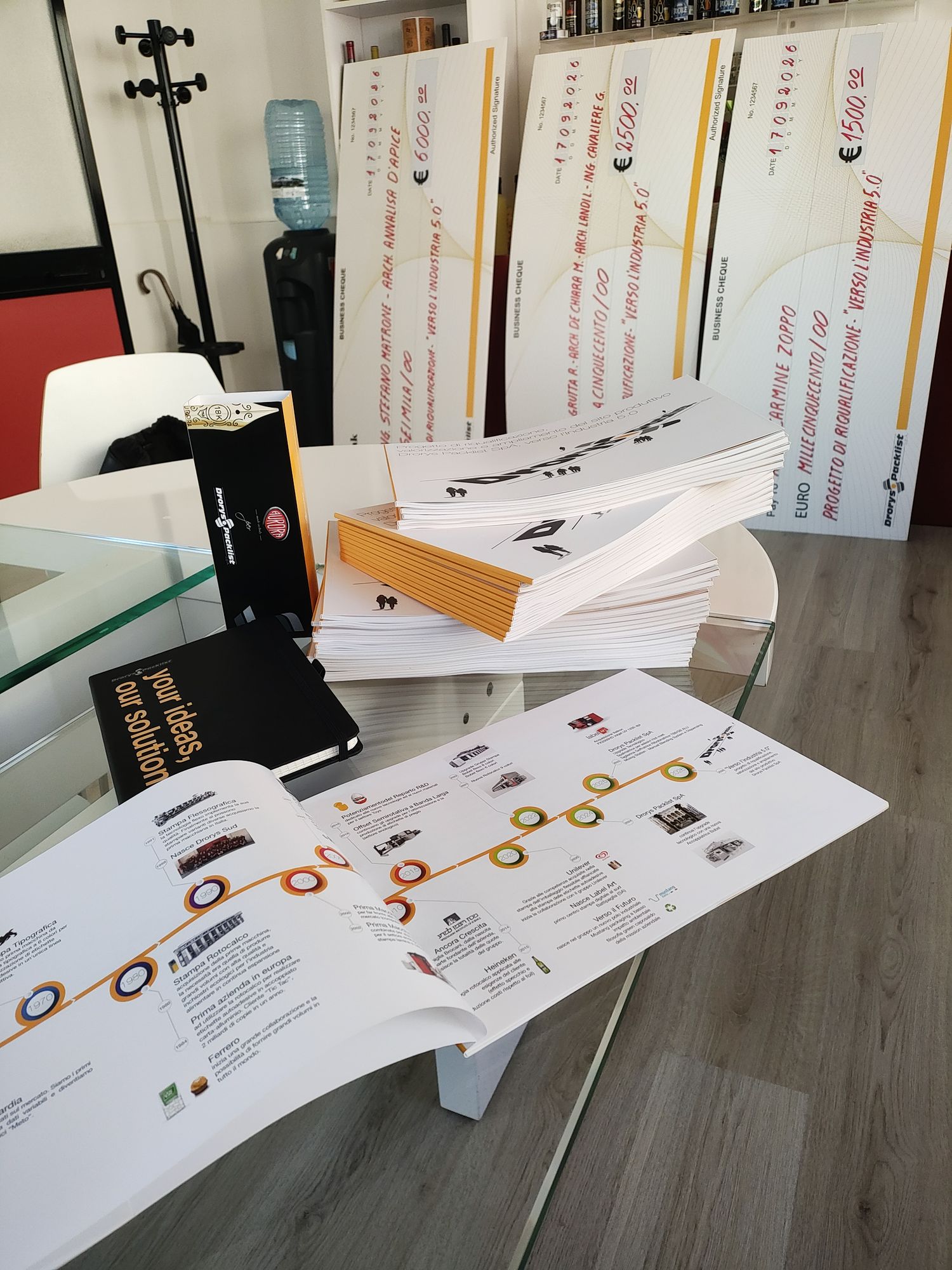 The prize checks and copies of the publication featuring the contest entries